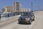 2013 BMW X5 xDrive35i in Sparkling Bronze Metallic - Driving Front Left View